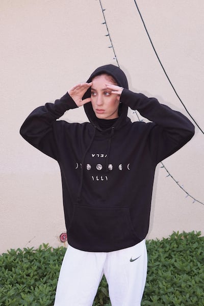 Vela's name is written upside down on their hoodies 'because we are living in a topsy-turvy world'.