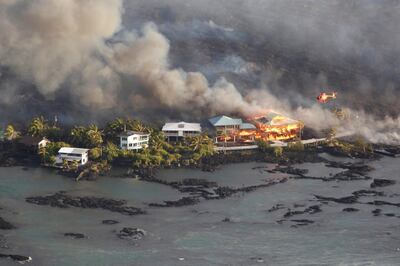 Lava destroys homes in the Kapoho area, east of Pahoa. Reuters