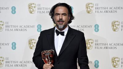 Best director Alejandro Inarritu holds his award at the British Academy of Film and Television Arts (BAFTA) Awards at the Royal Opera House in London. Reuters