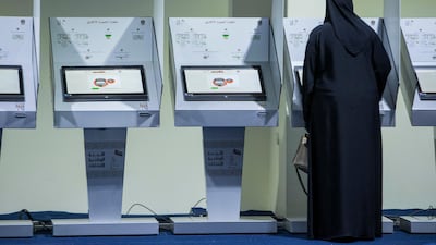 Voters at the polling machines for the 2015 Federal National Council election in Fujairah. Antonie Robertson / The National