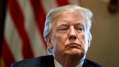US president Donald Trump listens during a meeting with lawmakers on immigration policy in the cabinet room of the White House in Washington on January 9, 2018. He reportedly made the disparaging remarks about African countries two days later. Evan Vucci, File / AP