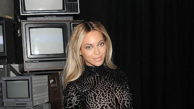 After shopping at a Walmart in Tewksbury, Massachusetts, Beyonce offered to pay the first $50 of all the existing shoppers' holiday gifts. Jamie McCarthy / Getty Images / AFP