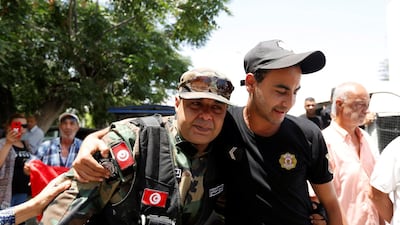 Police officers mourn Anis El Werghi during his funeral in Tunis on July 9, 2018. The Tunisian security forces member was killed in an ambush near the border with Algeria earlier in the week . Reuters