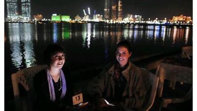 They're usually on the other side of the camera: the filmmakers Alicia Sully, left, and Philippa Young take a break in Abu Dhabi.