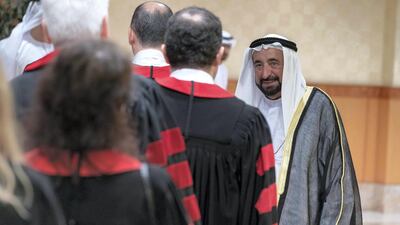 Sheikh Dr Sultan bin Muhammad Al Qasimi, Ruler of Sharjah and president of the American University of Sharjah, congratulates students on their graduation and hands them their degrees during their graduation ceremony on Saturday .Wam