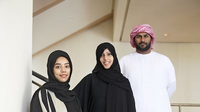 From left, Fatima Al Hashemi, Eman Al Hashimi and Mohammed Al Awadi, participants in Music in Hospitals. Lee Hoagland / The National