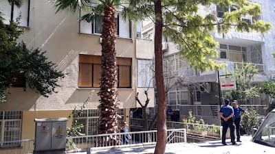 Turkish police officers stand guard next to an apartment of US Pastor Andrew Brunson on July 27, 2018 in Izmir. AFP