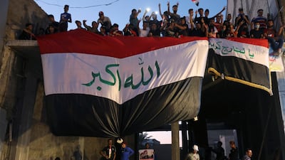 Demonstrators gesture during an anti-government protest in Kerbala. Reuters