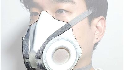 Researchers have developed a new AI-powered face mask fitted with pores which adapt to a person's surroundings. Photo: ACS Nano