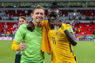 Australia's Craig Goodwin and Awer Mabil celebrate after beating the UAE in their World Cup play-off qualifier. AFP