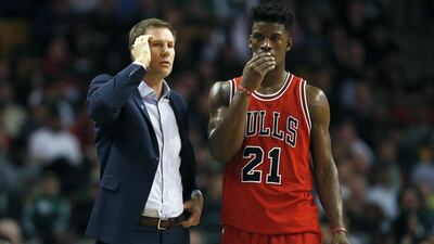 Jimmy Butler, right, has remained productive despite the Chicago Bulls' struggles this season. Michael Dwyer / AP Photo