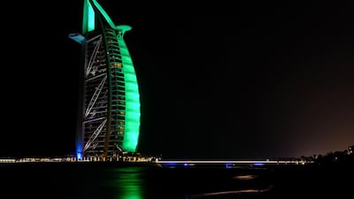 Burj al Arab hotel lit up green in celebration of St Patrick's Day. WAM