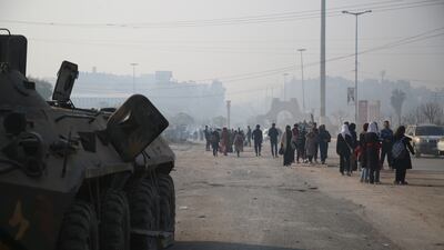 Displaced people return to the city of Hama, Syria. EPA