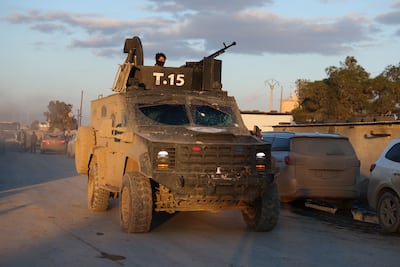 Syrian government forces deployed near a prison holding ISIS inmates. Getty Images