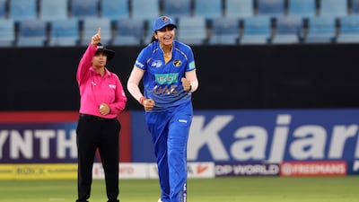 UAE's Esha Oza celebrates the wicket of Indonesia's Rahmawati Pangestuti