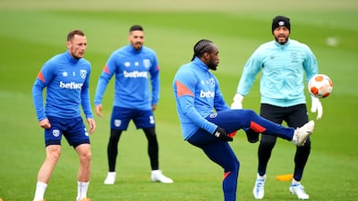 Michail Antonio controls the ball watched by Vladimir Coufal, Manuel Lanzini and goalkeeper Darren Randolph. PA