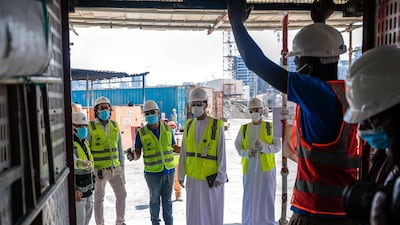 Abu Dhabi City Municipality inspectors on a safety inspection. Victor Besa / The National
