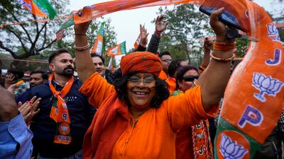 Supporters of India's ruling Bharatiya Janata Party celebrate victory in the Rajasthan state election in Jaipur, India, on Sunday. AP