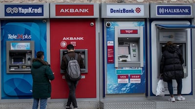 Turkish bank ATM machines in Istanbul. Several of the country's lenders require billions and quickly. Getty