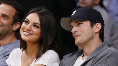Mila Kunis and Ashton Kutcher. Danny Moloshok / AP Photo