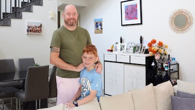 Andrew Burgess with his son Cyrus. All Photos: Chris Whiteoak / The National