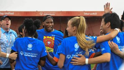 Drogba cheers with his team.