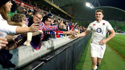 England player Owen Farrell celebrates with supporters after defeating Australia on Saturday in Melbourne. Brandon Malone / Reuters