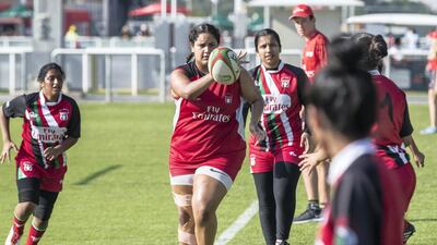 Al Maha School girls team in action.