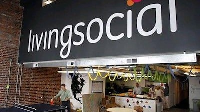 The US retail giant LivingSocial plans to launch its “Instant” mobile-deals service in the region early next year. Jacquelyn Martin / AP Photo