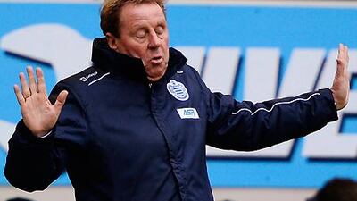 Queens Park Rangers coach Harry Redknapp shows the strain against Everton.