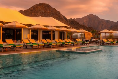 The infinity pool offers stunning views of the mountains. Photo: Caravan Hatta by Our Habitas