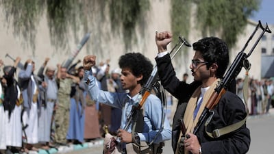 Tribesmen loyal to Houthi rebels chant slogans with weapons during a gathering aimed at mobilizing more fighters for the Houthi movement in Sanaa, Yemen, Tuesday, Feb. 25, 2020. (AP Photo/Hani Mohammed)