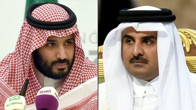 Saudi Crown Prince Mohammed bin Salman, left, and Qatar's Emir Sheikh Tamim bin Hamad Al Thani. Fayez Nureldine / AFP