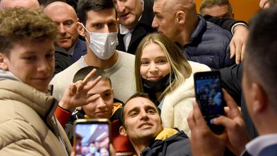 Novak Djokovic poses for photographs with fans in Budva. AFP