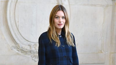 French model Camille Rowe poses during ahead of the Dior Women's Spring-Summer 2020 show. AFP