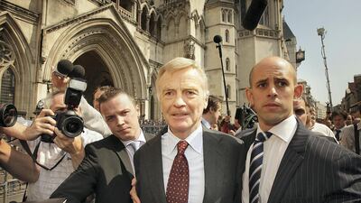 Max Mosley leaves the High Court in 2008 in London, after he won his legal action against the News of the World newspaper. Getty Images