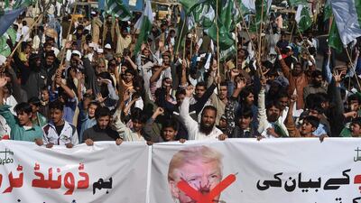 Difa-e-Pakistan Council activists at an anti-US protest in Karachi on Tuesday. Pakistan summoned the US ambassador in a rare public rebuke after Donald Trump lashed out at Islamabad with threats to cut aid. AFP
