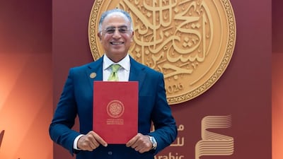 Egyptian novelist Ashraf Elashmawy with his 2026 Sheikh Zayed Book Award for Literature, which he won for Births in the Zoo. Photo: Abu Dhabi Arabic Language Centre