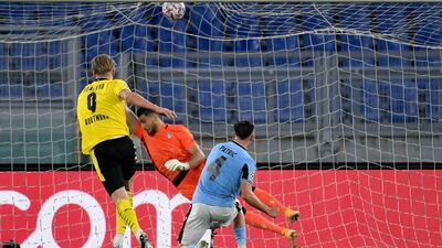 Erling Braut Haaland scores for Dortmund. Getty