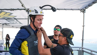 The National's intrepid reporter gets suited up on the 42nd floor. Victor Besa for The National
