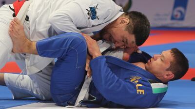 Kuanysh Kabildin from Kazakhstan (white) fights with Cesar Santanilla from Colombia in Abu Dhabi's World Professional Jiu Jitsu Championship 2016. Ravindranath / The National