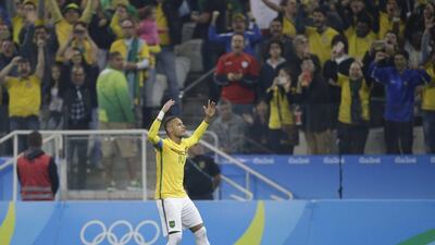 Brazil’s Neymar celebrates scoring his side’s first goal during a quarter-final match of the men’s Olympic football tournament between Brazil and Colombia at the Arena Corinthians stadium, in Sao Paulo, Brazil, Saturday, August 13, 2016. Nelson Antoine / AP Photo