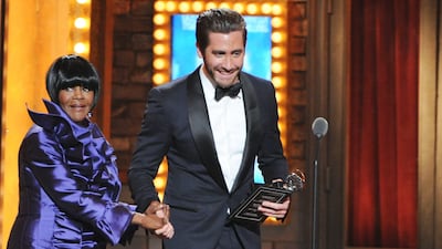 Winner for Best Performance by a Leading Actress in a Leading Role in a Play, Cicely Tyson, left, gets walked to the microphone by actor Jake Gyllenhaal . Evan Agostini / Invision / AP