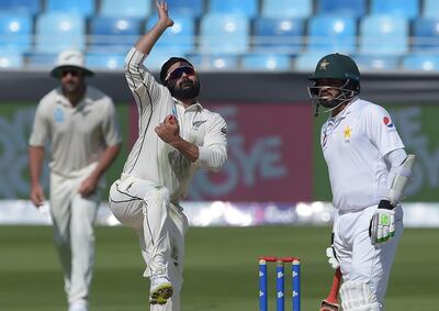 New Zealand left-arm spinner Ajaz Patel, centre, bowled with great control on the first day of the Dubai Test. AFP