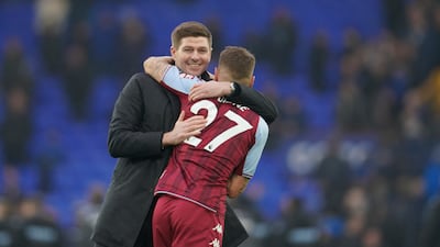 Aston Villa's manager Steven Gerrard hugs Lucas Digne after the win over Everton. AP