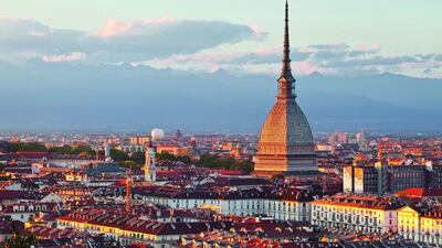 Sunset in Turin. The Italian city has developed from an industrial centre into a popular city-break destination. Julian Elliott / Robert Harding World Imagery / Corbis