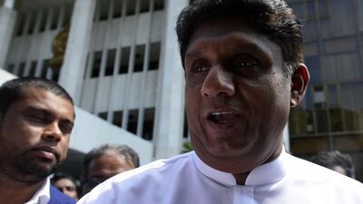 Sri Lankan politician Sajith Premadasa leaves the Supreme Court after filing a petition against President Maithripala Sirisena's sacking of parliament. AFP