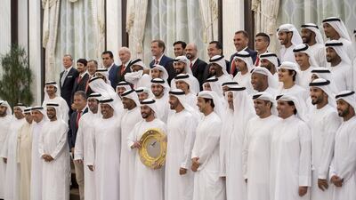 Sheikh Mohammed bin Zayed, Crown Prince of Abu Dhabi and Deputy Supreme Commander of the Armed Forces, stands for a photograph with Al Jazira Football Club during an iftar reception at Al Bateen Palace. Seen with Sheikh Mansour bin Zayed, Deputy Prime Minister and Minister of Presidential Affairs, Sheikh Hamdan bin Zayed, Ruler’s Representative in the Western Region of Abu Dhabi, Sheikh Mohammed bin Hamdan (11th R) and Mohammed Al Romaithi, Chairman of Thani Murshed Establishment (10th R). Rashed Al Mansoori / Crown Prince Court — Abu Dhabi