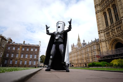 Count Binface poses outside UK parliament. PA
