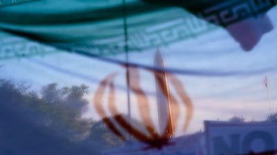 The Iranian flag during a protest in Washington against military action in Iran. Reuters